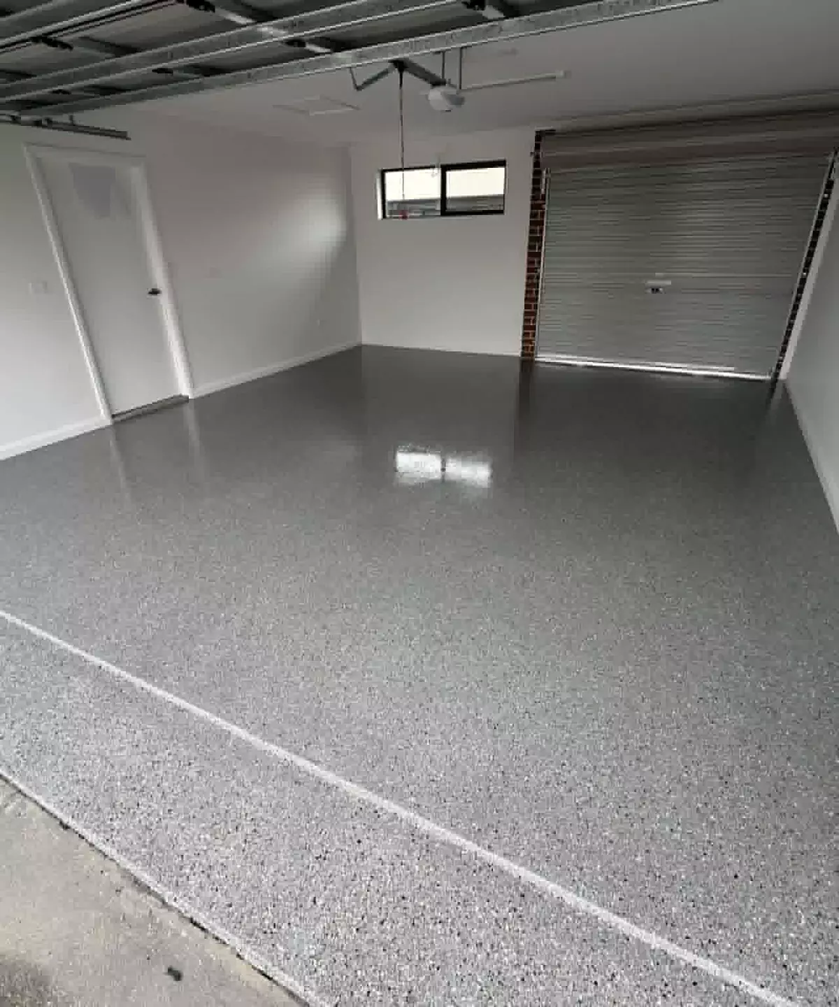 Finished epoxy garage floor with a flake finish
